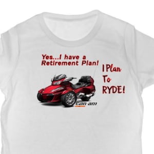 May include: White t-shirt with a red and black Can-Am Spyder motorcycle graphic. The text on the shirt reads "Yes...I have a Retirement Plan! I Plan To RYDE!"