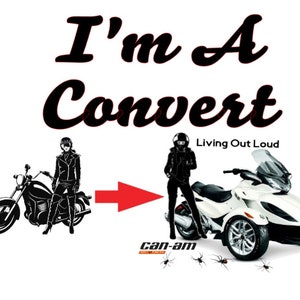 May include: Graphic showing a motorcycle transforming into a white Can-Am Spyder three-wheeled vehicle. The text reads "I'm A Convert" and "Living Out Loud". The Can-Am logo is also visible.