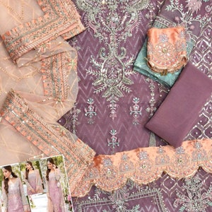 May include: A formal, lavender-colored embroidered dress with intricate silver and pearl embellishments. The dress features a detailed neckline, a matching scarf, and a peach-colored trim. A smaller image in the corner shows the dress being worn.