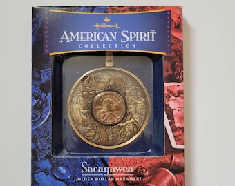 SACAGAWEA~AMERICAN SPIRIT Collection~Hallmark~Golden Dollar Ornament w/Certificate Of Authenticity and Tri-Fold  Brochure~Dated 2000