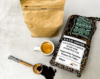 Ugandan Finely ground coffee: 500g Rich Arabica blend from Mbale, Uganda. In Vibrant wax fabric bag.