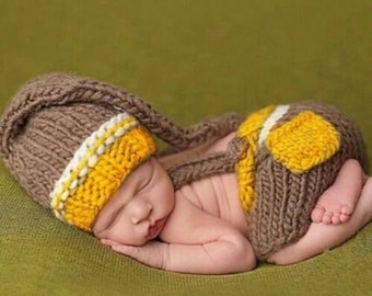 Babyfotoshooting Neugeborenenfotografie Babyfoto Newborn Babyhose Babymütze
