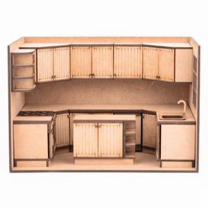May include: A miniature wooden kitchen model featuring light brown cabinets, a stove, sink, and island. The cabinets have vertical grooved detailing. The model is designed with a U-shaped layout, including upper and lower cabinets, and a small window.