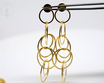 Long earrings with flat eyelets, forged silver or plated with fine gold, playful earrings, ear jewelry by Katrin Detmers