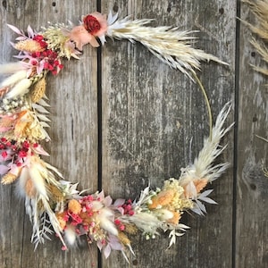 Couronne en fleurs séchées pêche/framboise