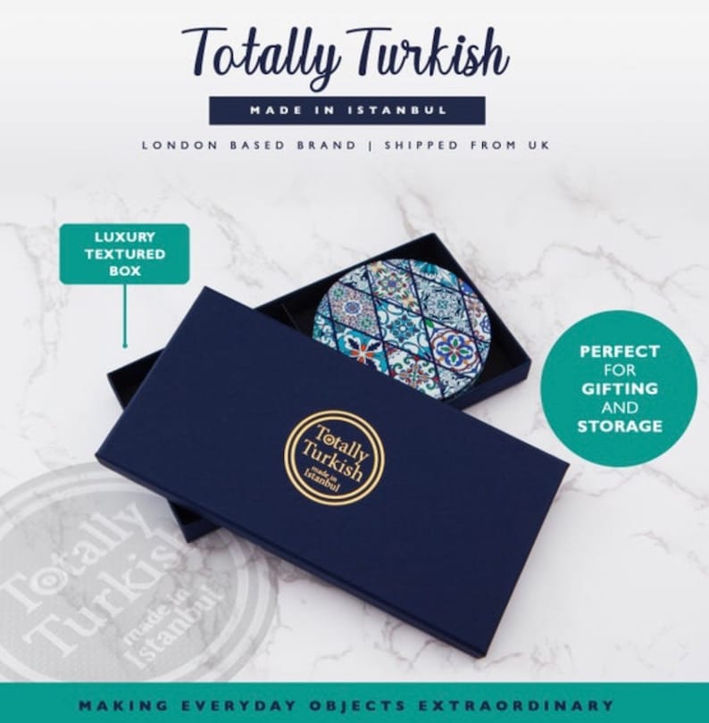 May include: A round, blue and white ceramic coaster with a geometric pattern. The coaster is in a blue box with the words "Totally Turkish" and "Made in Istanbul".