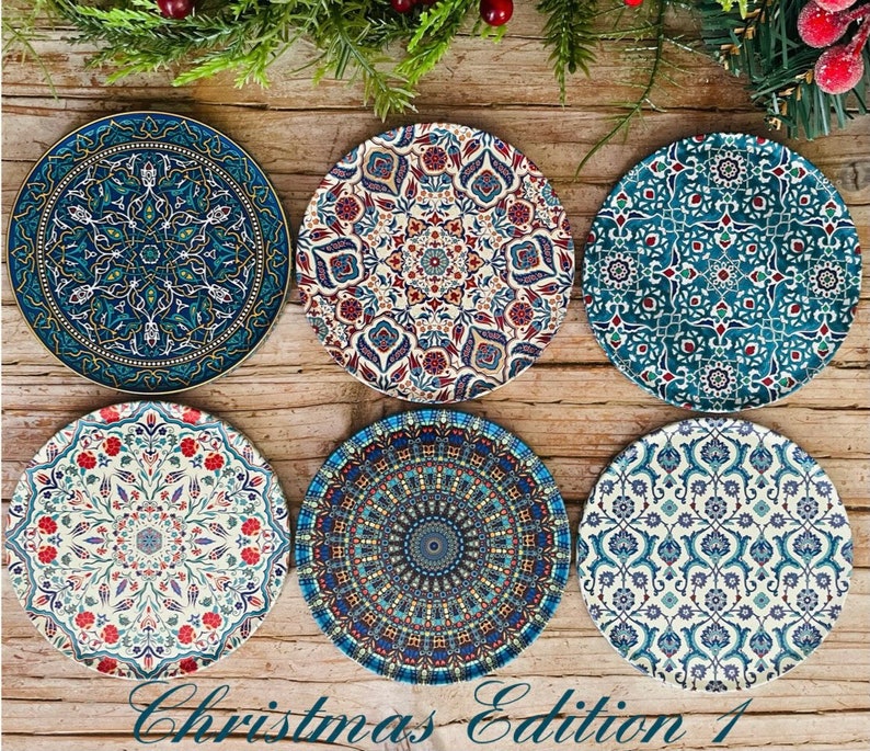 May include: Six decorative ceramic plates with intricate blue, red and white patterns. The plates feature a variety of geometric and floral designs.