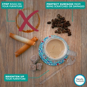May include: A close-up of a wooden table with a cup of coffee, sugar cubes, and two long, thin biscuits. The coffee cup is on a colourful coaster. The text "Stop rings on your furniture" is at the top left of the image. The text "Protect surfaces from being scratched or damaged" is at the top right of the image. The text "Brighten up your furniture" is at the bottom left of the image. The text "Totally Turkish" is at the bottom right of the image.