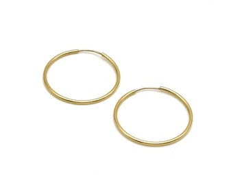 Brincos de argola femininos em ouro amarelo 18 quilates • Argolas em ouro amarelo 750 • Brincos de argola clássicos • Argolas polidas em ouro 750
