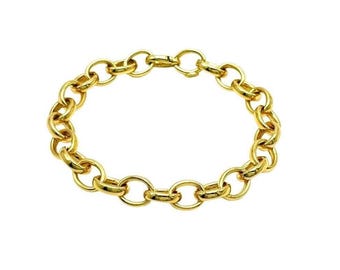 May include: A gold chain bracelet with a simple, classic design. The bracelet is made of thick, round links.