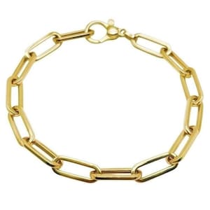 May include: A gold chain bracelet with a lobster clasp fastening. The chain is made of oval-shaped links.