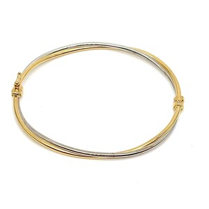 May include: A gold and silver bangle bracelet with a twisted design. The bracelet is made of two bands of metal that are intertwined.