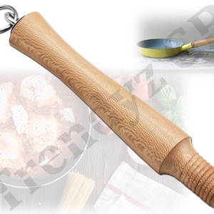 May include: A wooden kitchen utensil with a ring on the top. The utensil is light brown with a wood grain pattern. It has a threaded end.
