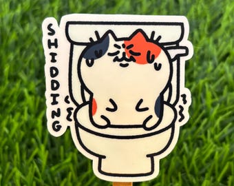 Shidding Toilet Cat Vinyl Sticker: Water-Resistant Laptop Decal AI FREE Human Made