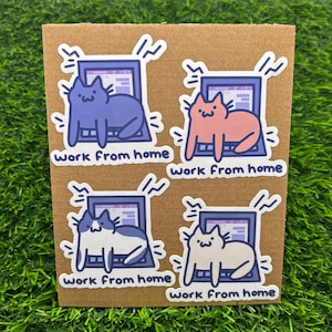 May include: Four stickers featuring cartoon cats working from home on a laptop. Each sticker has a different colored cat and the text "work from home" underneath.