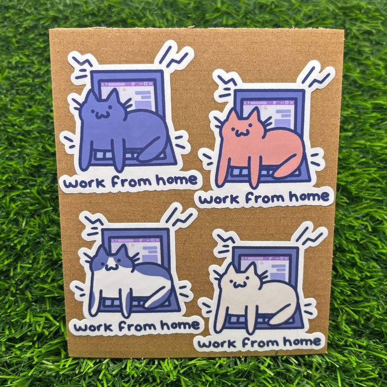 May include: Four stickers featuring cartoon cats working from home on a laptop. Each sticker has a different colored cat and the text "work from home" underneath.