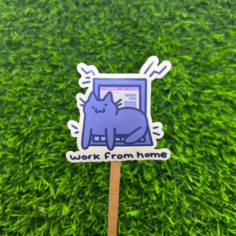 May include: A purple cat sits on a laptop with the text "Work from home" on a white background.
