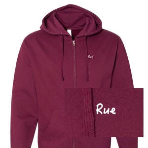 Rue&#39;s Maroon Hoodie | Maddy&#39;s Black Hoodie