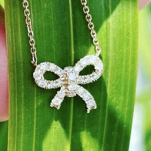 Diamond Bow Necklace 18in chain 14K Gold