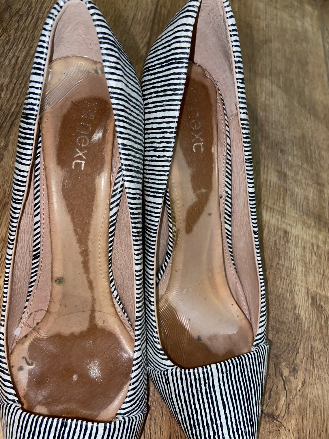 well worn trashed shoes