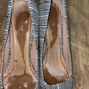 well worn trashed shoes