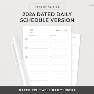 May include: A white planner insert with the text "2026 DATED DAILY SCHEDULE VERSION" and "DATED PRINTABLE DAILY INSERT". The insert includes sections for priorities and a schedule, with a white pen on the left.