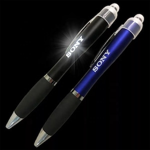 May include: Two pens with a black and blue finish. Both pens have a clear top with a stylus and the word "SONY" engraved on the side.