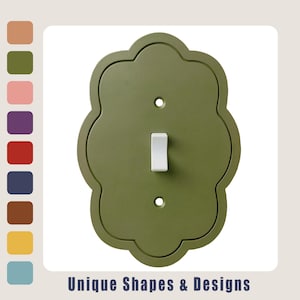 May include: An olive green light switch cover plate with a scalloped, quatrefoil-inspired shape and a central white toggle switch. The plate features two screw holes for mounting. Below the plate, the text reads Unique Shapes & Designs.
