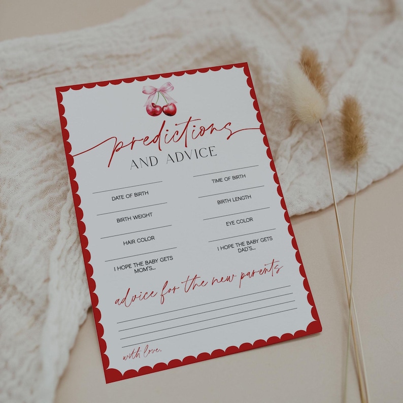 May include: A baby shower game card with a red scalloped border and cherry illustration. The card features prompts for predictions and advice, including date of birth, birth weight, and eye color. The text is in red script.