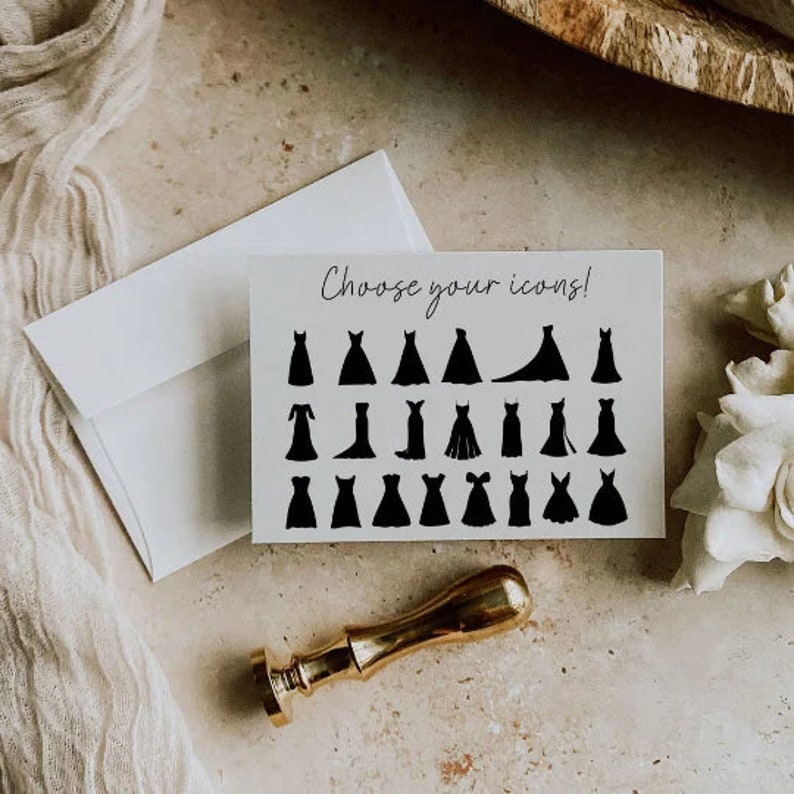 May include: A white card with the text "Choose your icons!" printed on it. The card features 24 black silhouette icons of different styles of dresses.