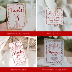May include: A selection of baby shower stationery with a festive design. Includes table numbers, favour tags, thank you tags, and a Momosa bar sign. Each item features red text and decorative borders with Christmas tree and snowman illustrations.