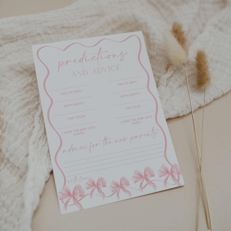 May include: A white baby shower game card with pink text and accents. The card reads "Predictions and Advice" and includes prompts for guests to fill out, such as "Date of Birth" and "Advice for the new parents."