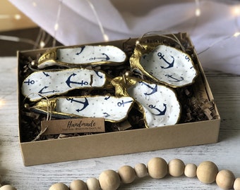 Nautical Christmas ornaments. Decoupaged oyster shells with blue anchor pattern. Great gift for beach lovers, boat captains or sailors.