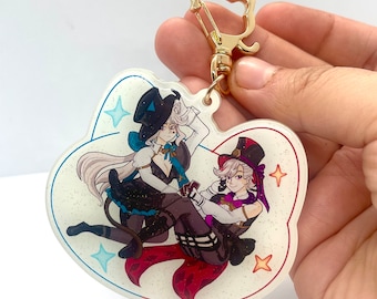 Lyney and Lynette glow in the dark acrylic keychain.