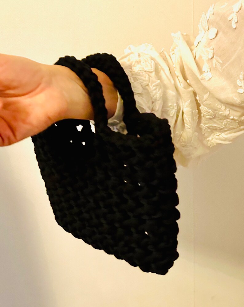 Elegant crocheted bag: Crocheted handbag in black coloured soft cotton yarn. Handmade by BothildSweden. image 1