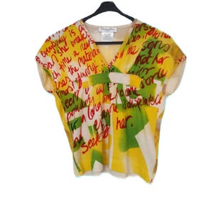 Camiseta com estampa gráfica incrível da CHRISTIAN DIOR "Difícil de encontrar" Colecionável DIOR vintage