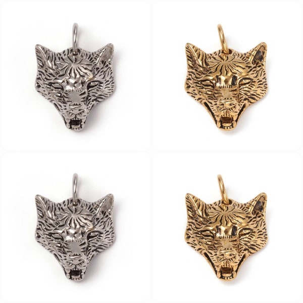 Pendentifs tête de loup en acier inoxydable. Or ou argent. Vendu à l'unité.