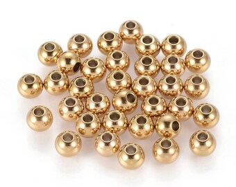 Perles acier inoxydable 304, plaquage sous vide or 18k. 4,5, 6, ou 8mm. Lot de 10 perles.