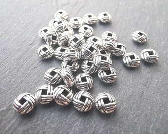 Perles intercalaires, séparateurs style tibétain en alliage argent antique 6mm. Lot de 10.