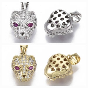 Leopard head pendant with zircon in 18k gold plated or 950 platinum plated. Sold individually.