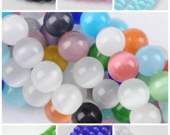 Perles œil de Chat naturelles. Coloris aux choix. 8mm ou 6mm.