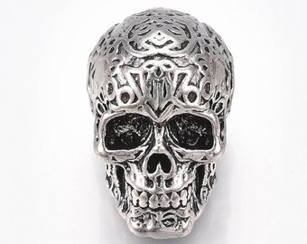 Large skull bead, Tibetan style. Alloy. Antique silver.