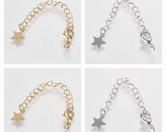 Chain extension with star in 18k gold plated and 950 platinum plated. 7cm. Sold individually.