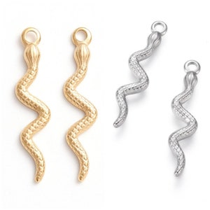 Pendant, snake charm in 304 stainless steel. Gold or silver. Sold individually