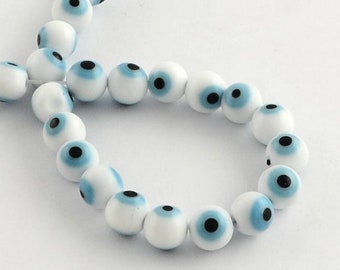 Glass evil eye beads. 6 or 8mm. Sold in packs of 10.
