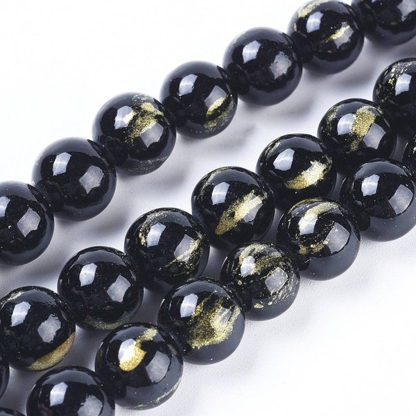 Perles jade Mashan naturelles noir avec feuilles d'or. 10mm, 8mm, 6mm, 4mm.