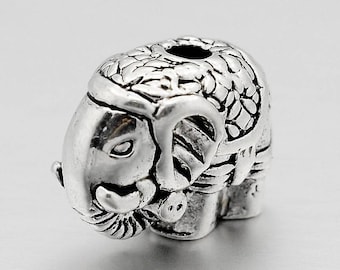 Tibetan style elephant beads in alloy. Antique silver. Sold individually.