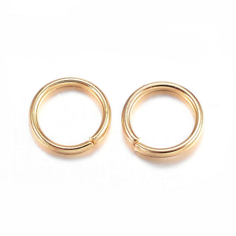 Open junction rings stainless steel 304. Gold. Size of your choice. image 1