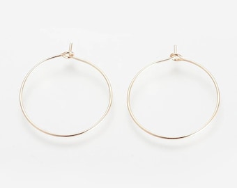 Pendientes de aro bañados en oro de 18k. 20 mm. Paquete de 10.