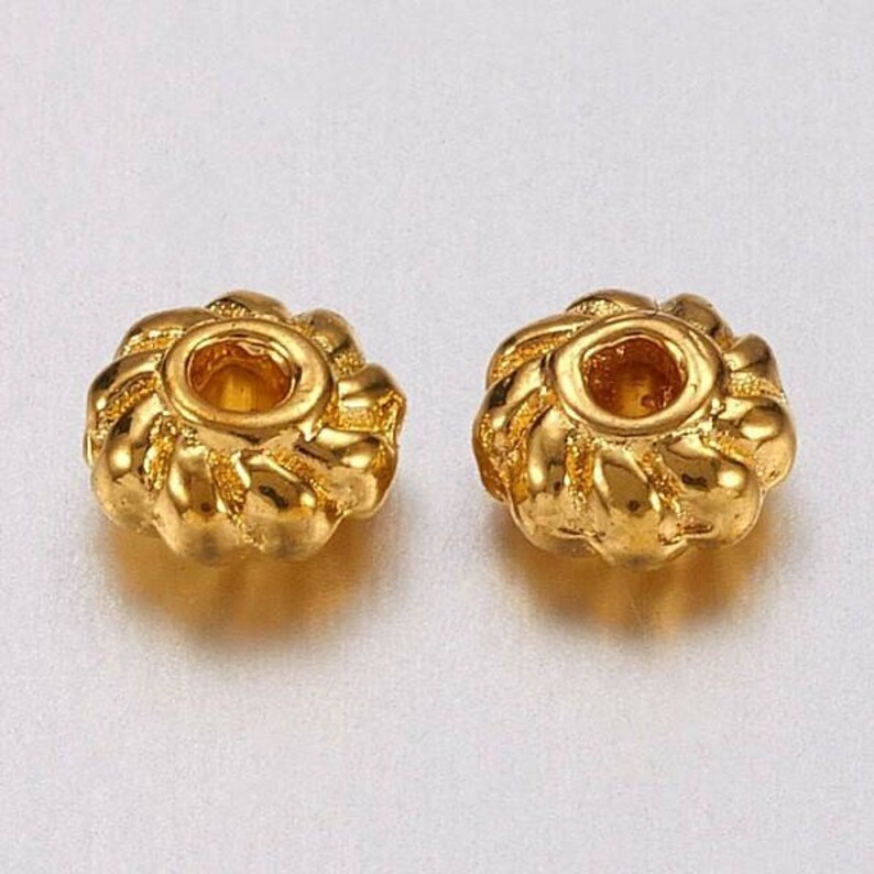 4mm Lot of 20 beads. Gold Infill beads in alloys